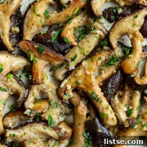 Sautéed Shiitake Mushrooms garnished with fresh parsley.