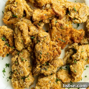 Fried oyster mushrooms on a plate.