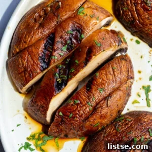 Sliced portobello mushrooms ready for grilling.