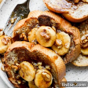 Bananas Foster French Toast served on a white plate.