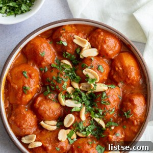 Dum Aloo served in a large bowl.