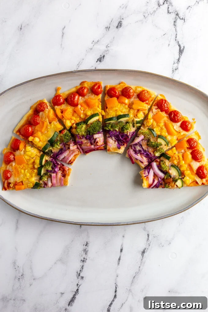Rainbow Pizza with a bowl in the center, demonstrating the technique for two half-circle pizzas.