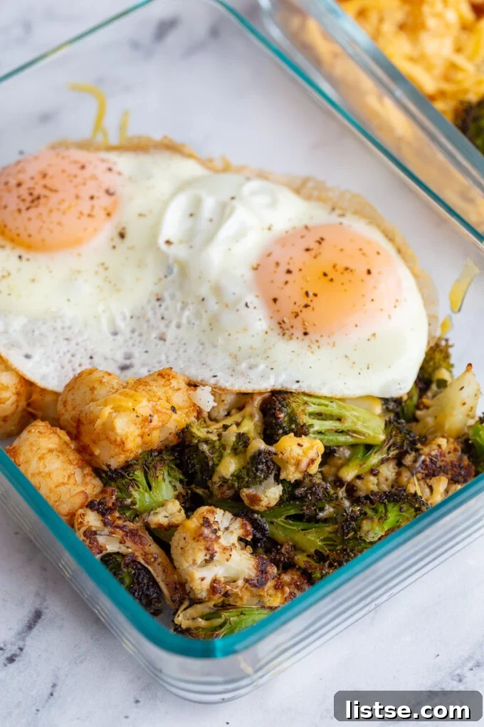Plant-Powered Breakfast Prep 3 Close-up of a prepared meal prep veggie breakfast bowl, ready to be heated and topped with an egg.