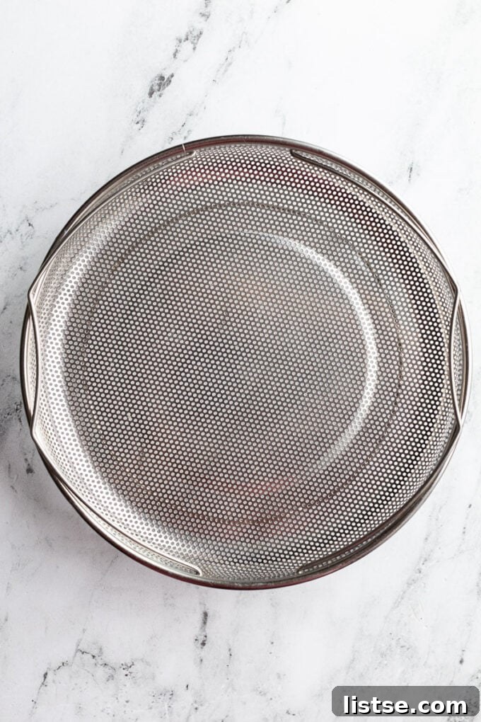 Stainless steel steamer basket made for the Always Pan