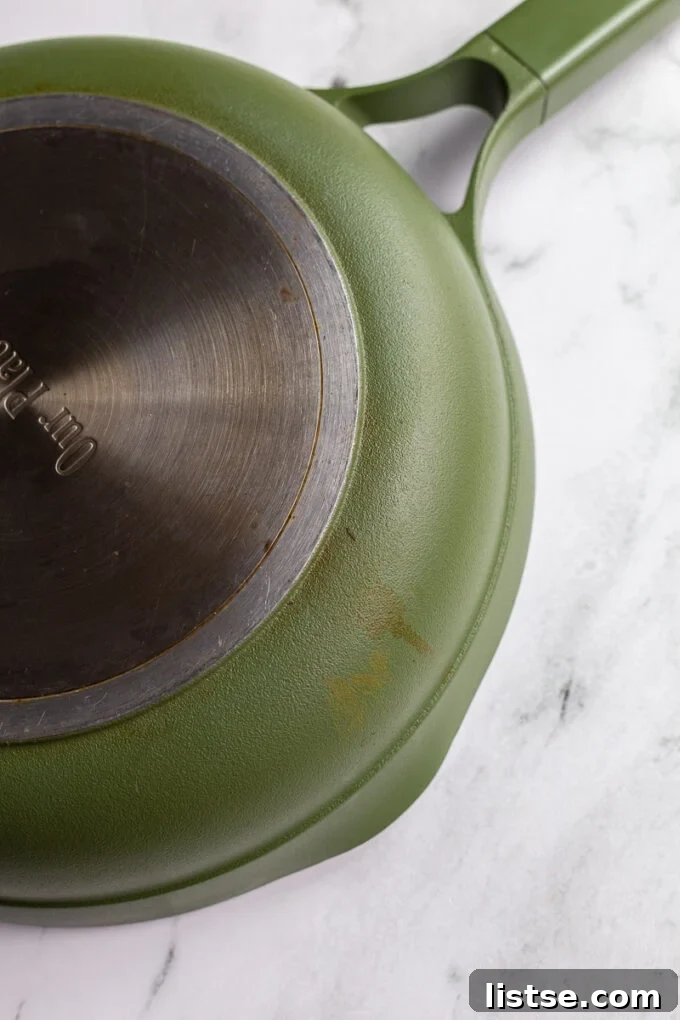 Discoloration on the bottom side of a green Always Pan after extended use