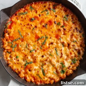 Cheesy White Bean Bake in a skillet.