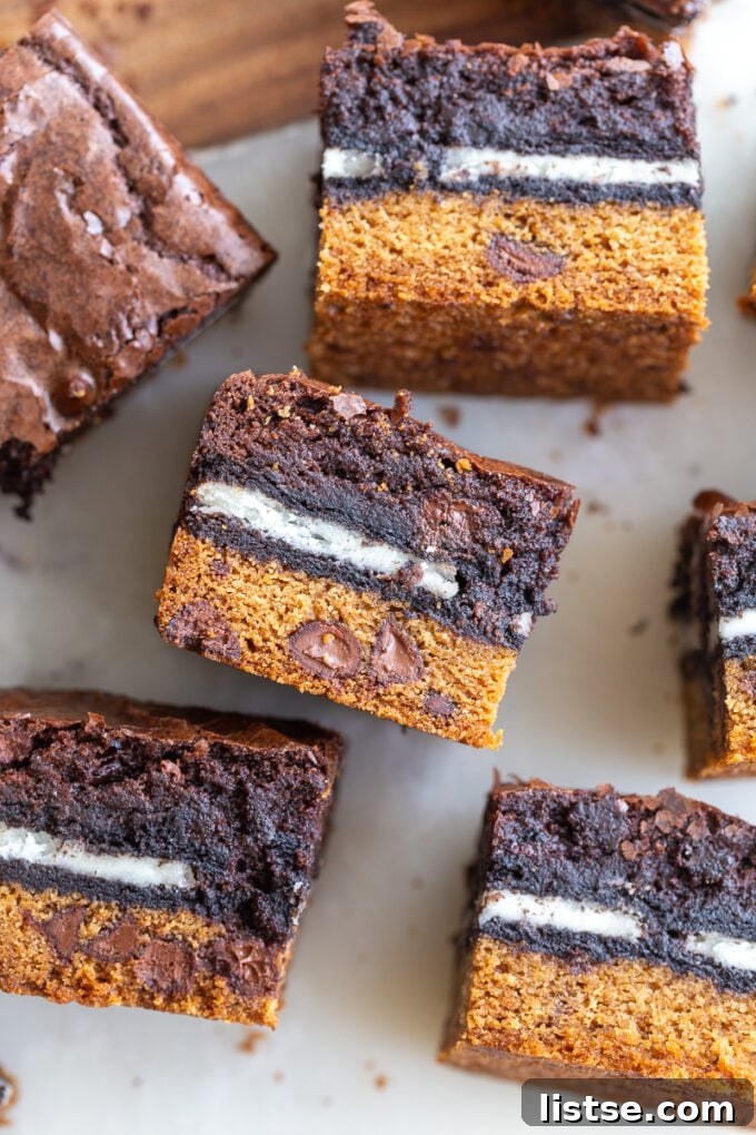 Decadent Layered Brownies 5 A plate with several layered Slutty Brownies, ready to be served, showing the three distinct layers.