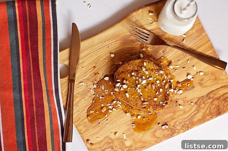 Spiced Pumpkin Protein Stacks 14 Stack of Pumpkin Protein Pancakes with Syrup and Fruit