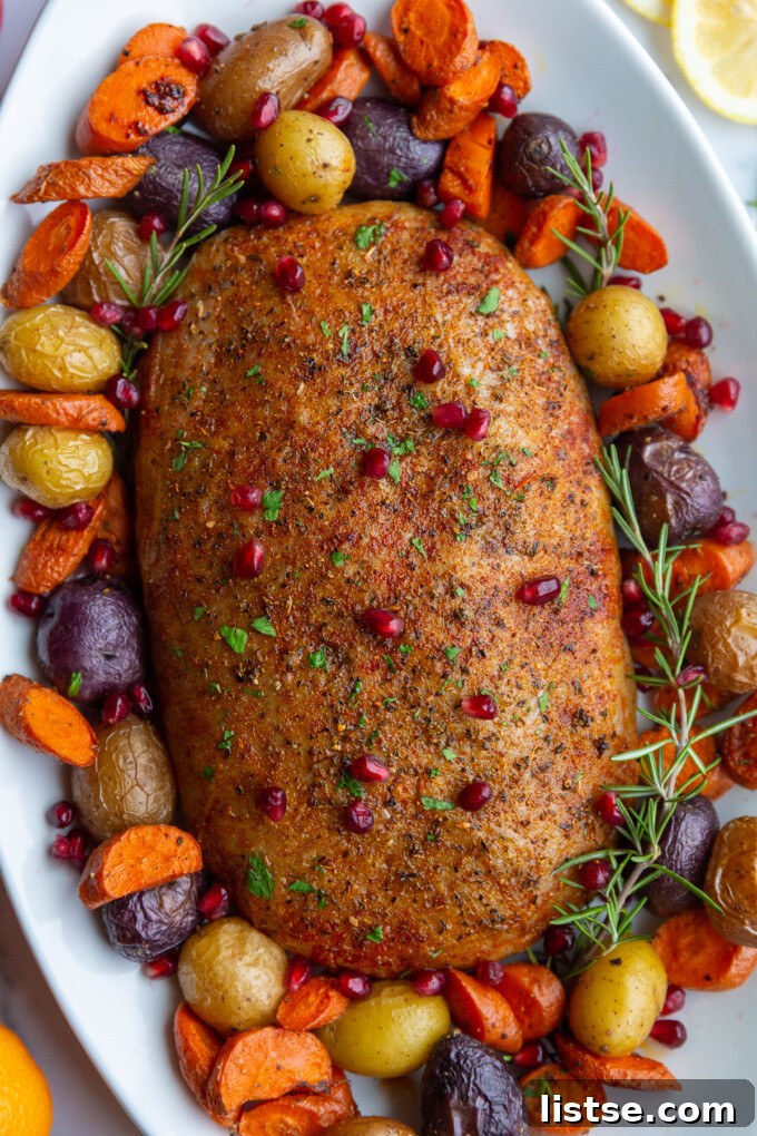 Stuffed Vegan Holiday Roast 11 A festive platter with generous slices of stuffed vegan turkey roast, surrounded by roasted root vegetables and fresh herbs, ready for a holiday feast.