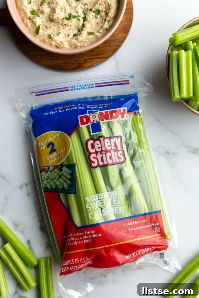 A clear shot of a branded bag of Dandy celery sticks, emphasizing their freshness and readiness for snacking.