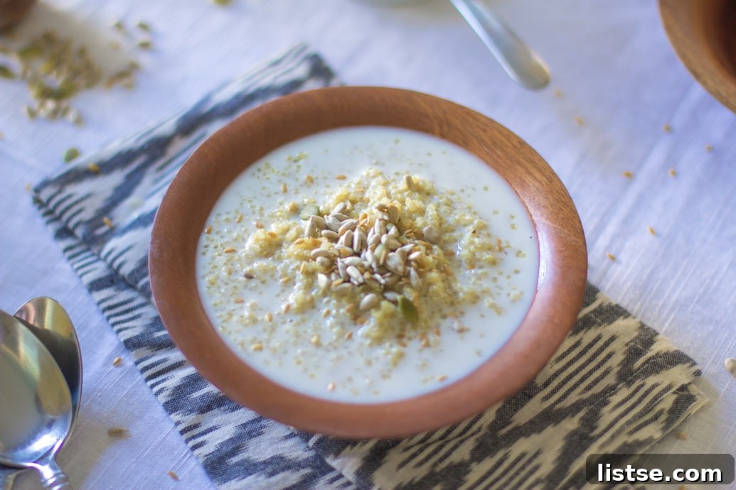 Adding honey to the Quinoa Breakfast Cereal Bowl