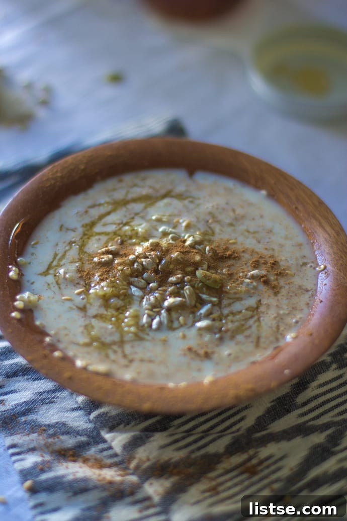 Adding toppings to the Quinoa Breakfast Cereal Bowl