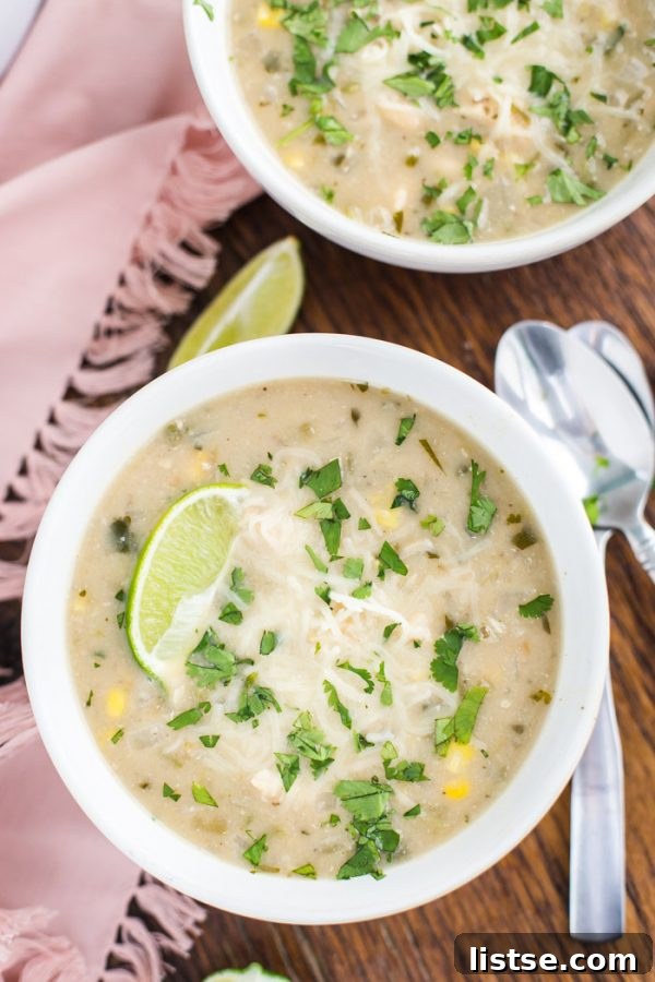 Creamy White Chicken Chili served in a rustic bowl, garnished with fresh cilantro.