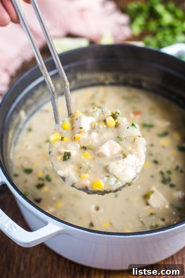 A close-up view of White Chicken Chili, showcasing its rich, creamy texture and vibrant ingredients.