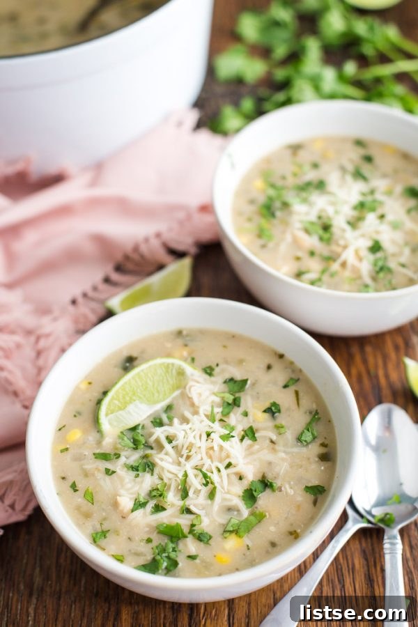 A rustic bowl filled with homemade White Chicken Chili, ready to be enjoyed.