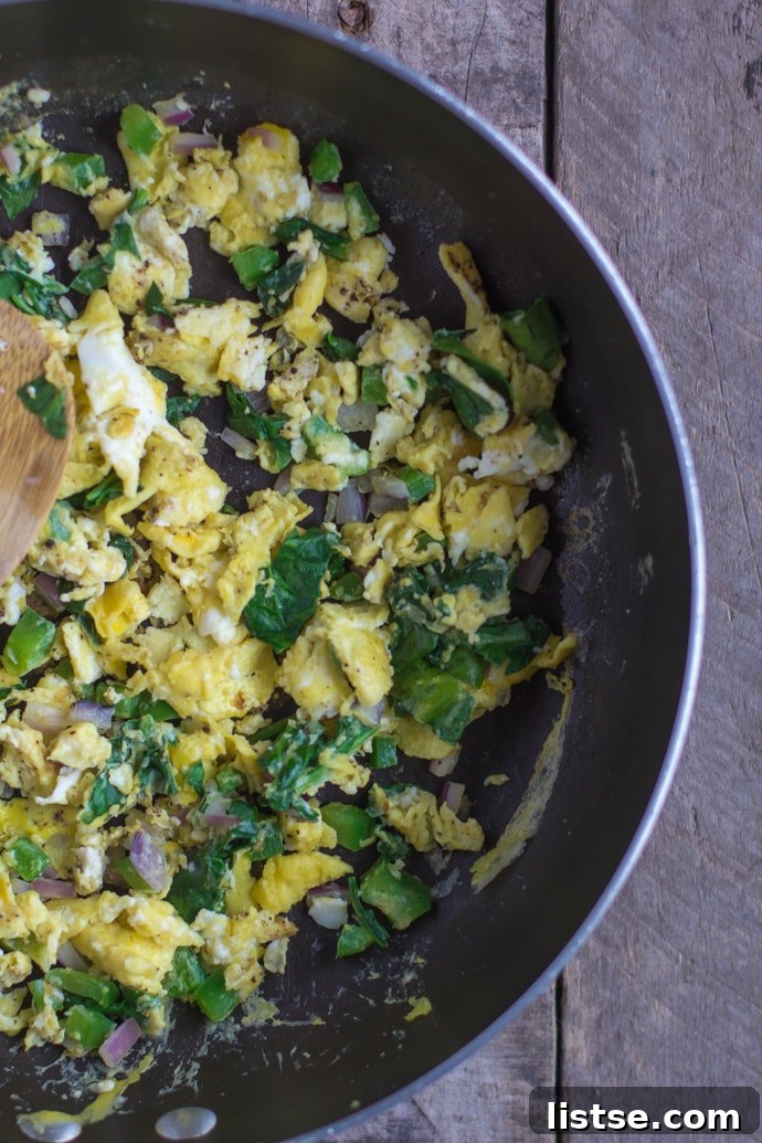 Savory egg scramble ready for crepe filling
