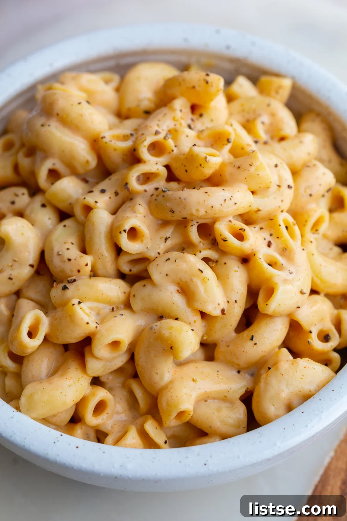Creamy Vegan Tofu Macaroni and Cheese 5 Creamy Tofu Mac and Cheese in a bowl, ready to be served, showcasing its rich texture.