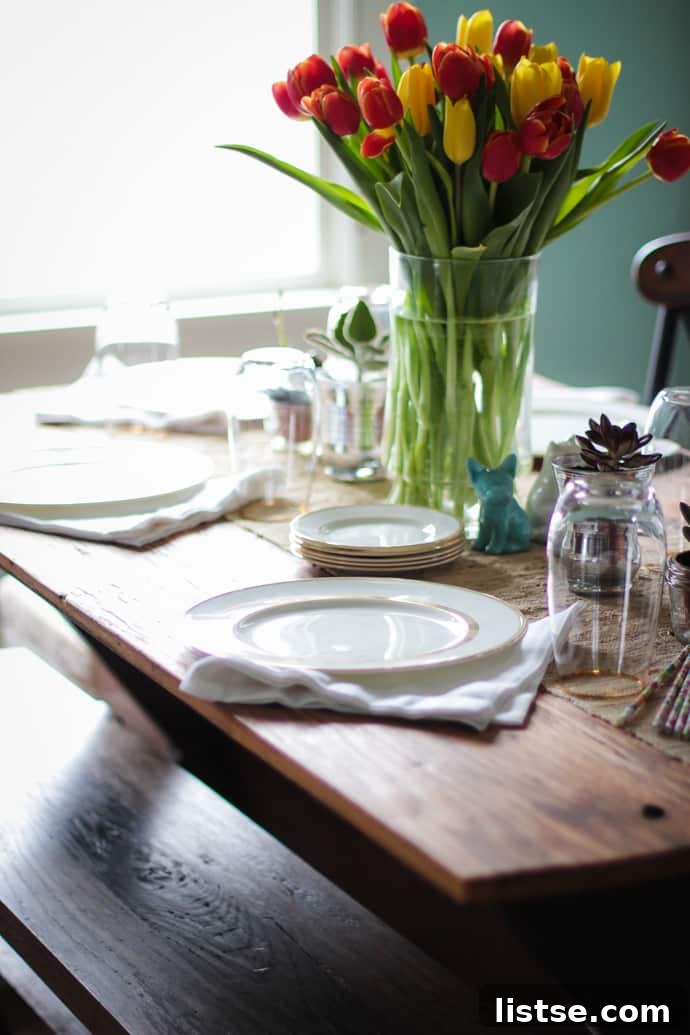 Evening in Bloom 2 A beautifully set spring dinner table with vibrant green dishes and a rustic charm.