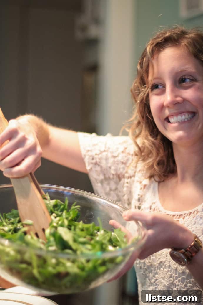 Evening in Bloom 17 Mary, a guest, showing genuine excitement as she prepares to eat the fresh Shaved Asparagus Spring Salad.