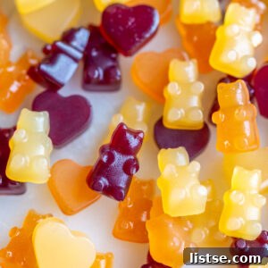 Vegan gummy bears that are yellow, orange and red.