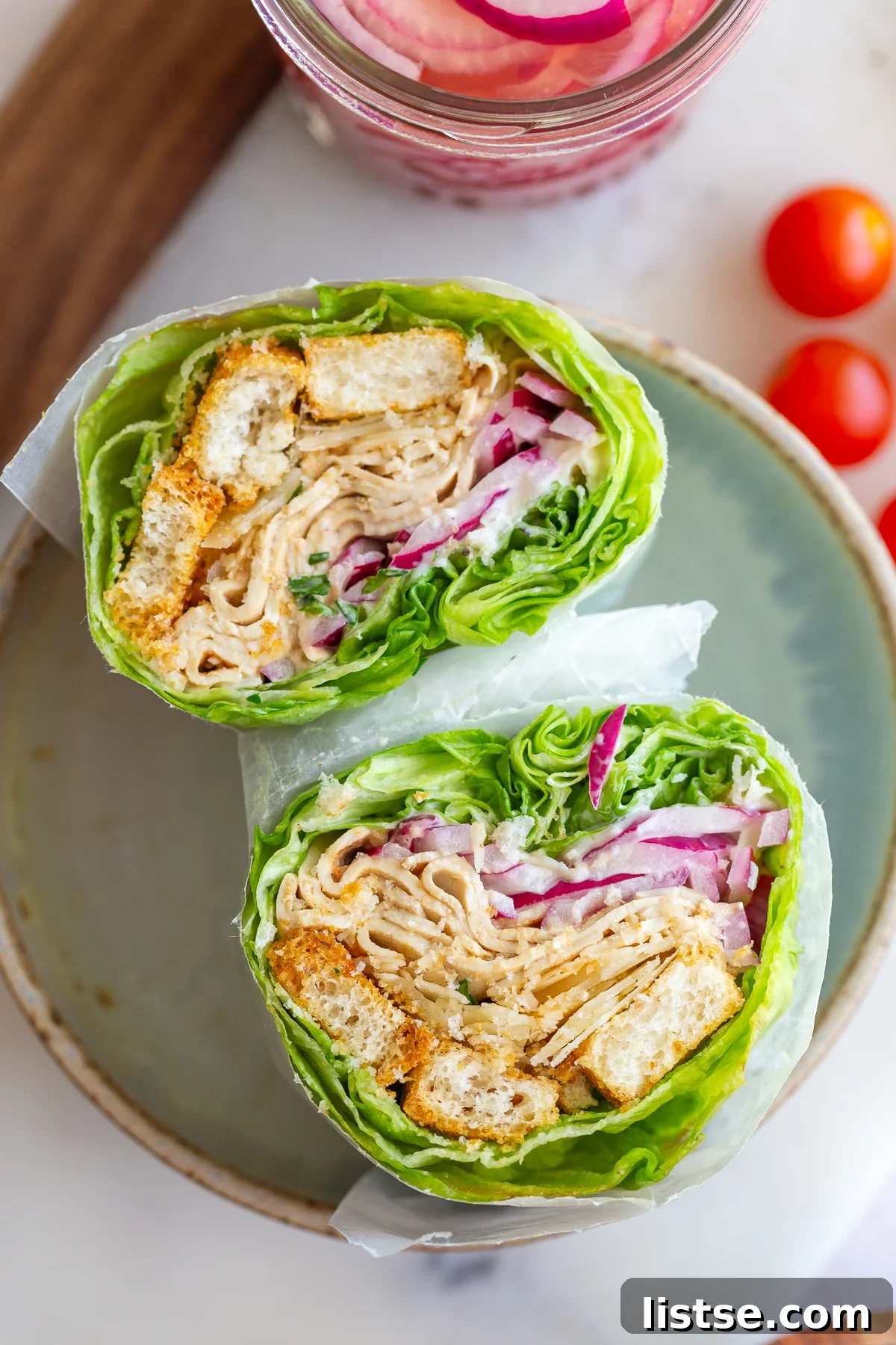 A vibrant bowl of tofu lettuce wraps, showcasing the fresh ingredients and appealing presentation.