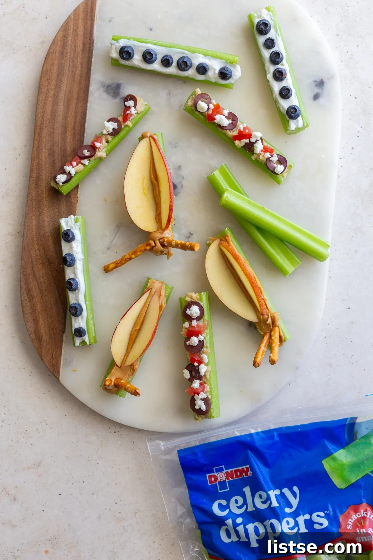Close-up of a plate with fresh Dandy Celery Dippers, ready for snacking and creative toppings.