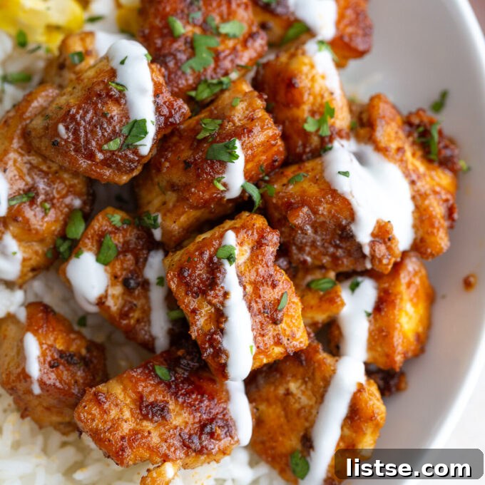 Summer Tofu Transformed: 3 Amazing Marinades 7 Crispy Nashville Hot Tofu on a plate, garnished with pickles
