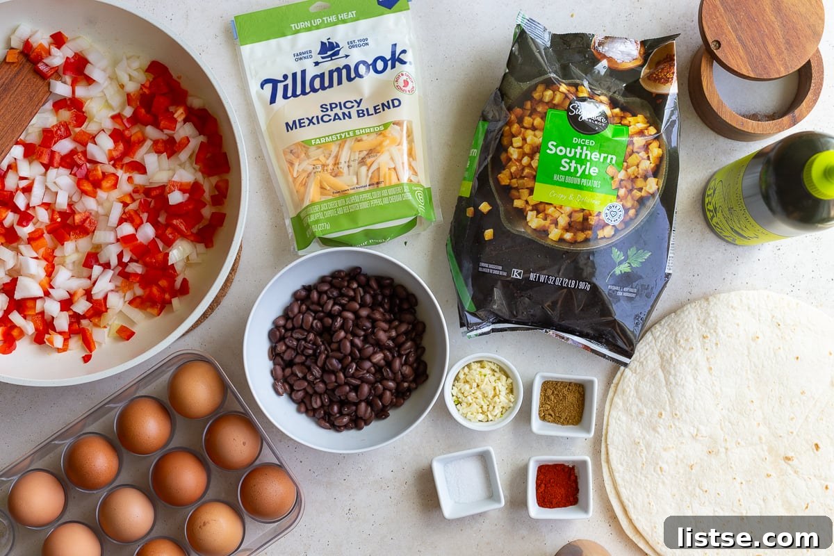 A vibrant collection of fresh ingredients neatly arranged for making high-protein egg and veggie breakfast burritos, featuring whisked eggs, colorful bell peppers, onions, garlic, a can of black beans, potatoes, and various spices.