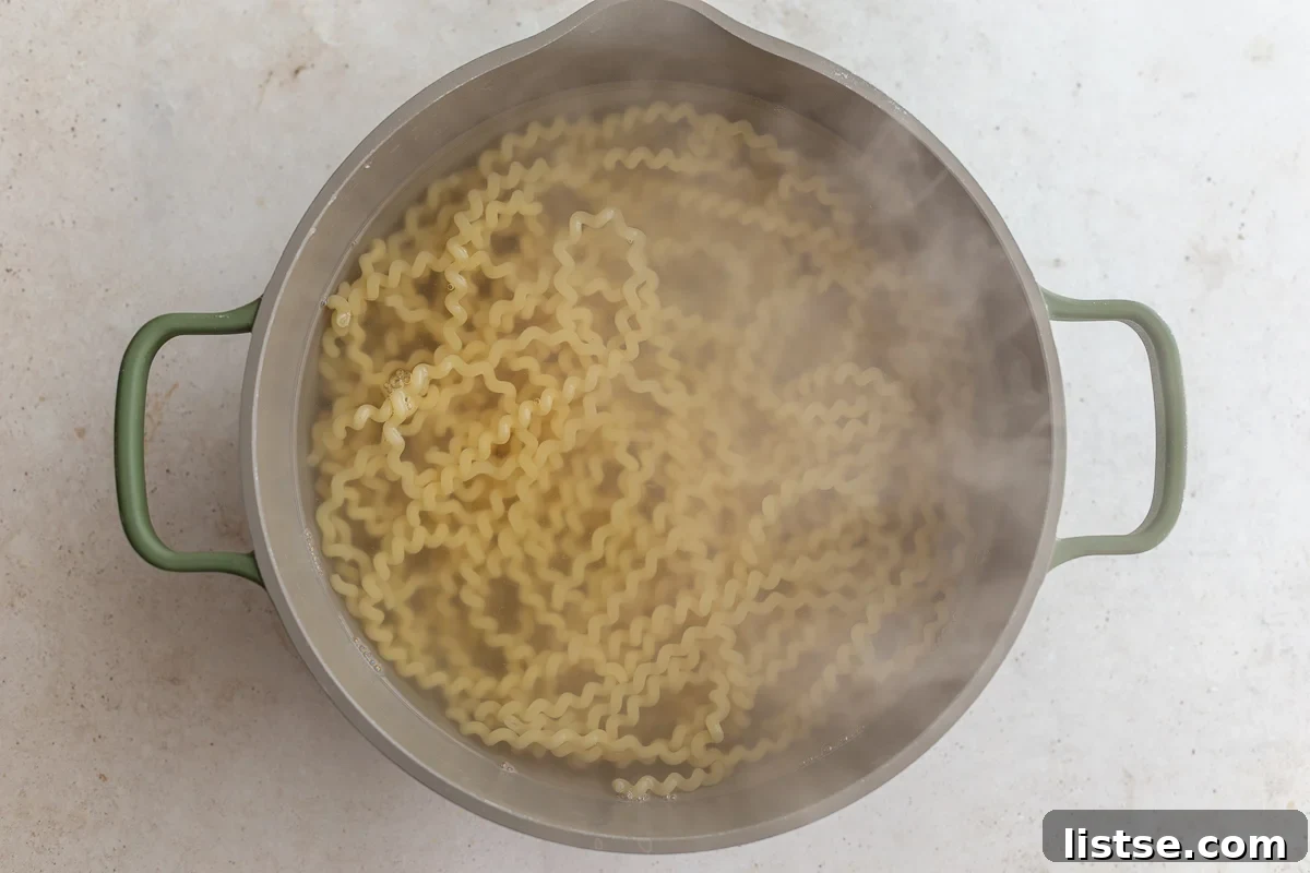 how to make ricotta pasta: cook your pasta and then drain and set aside