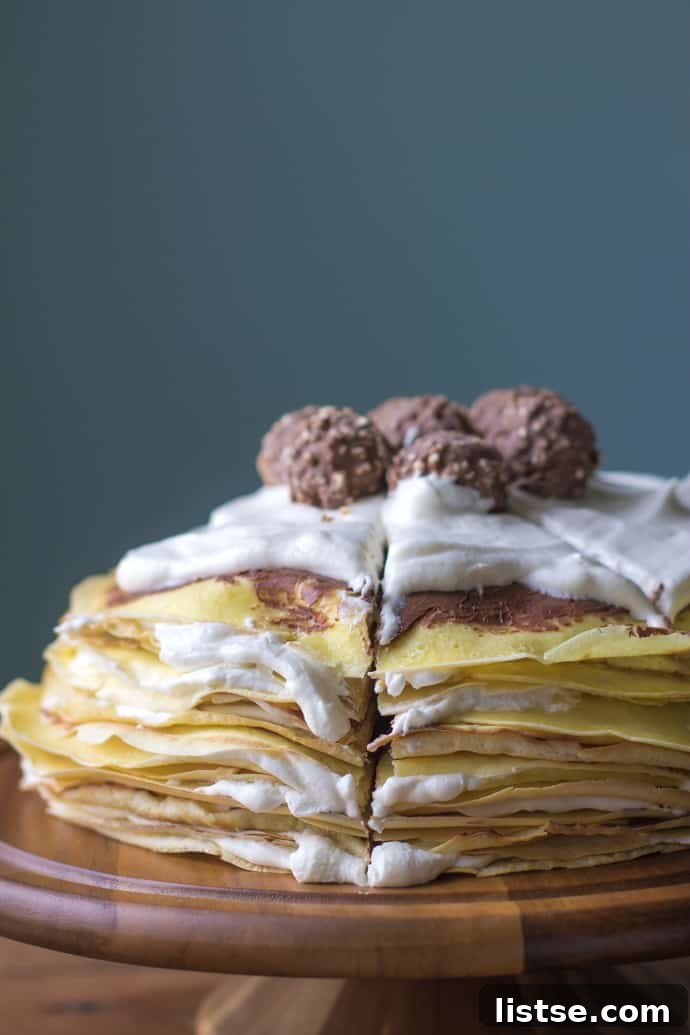 A beautiful slice of crepe cake showing multiple thin layers