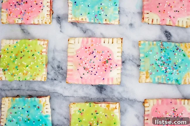 Homemade Strawberry Pop Tarts - Much better than store bought with flaky crust and sweet filling.
