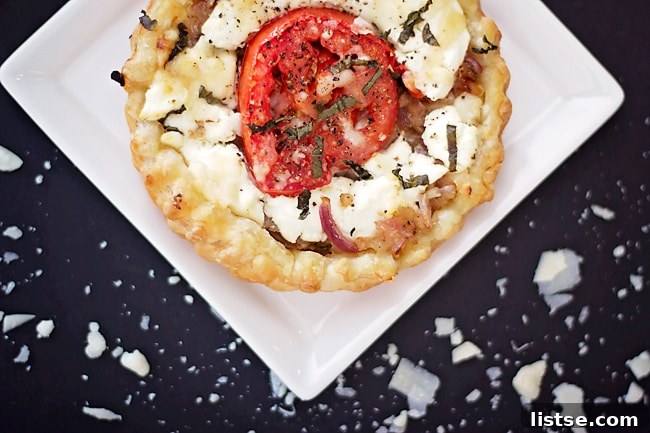 Goat Cheese and Thyme Tarts Several goat cheese and thyme tarts arranged artfully on a serving board