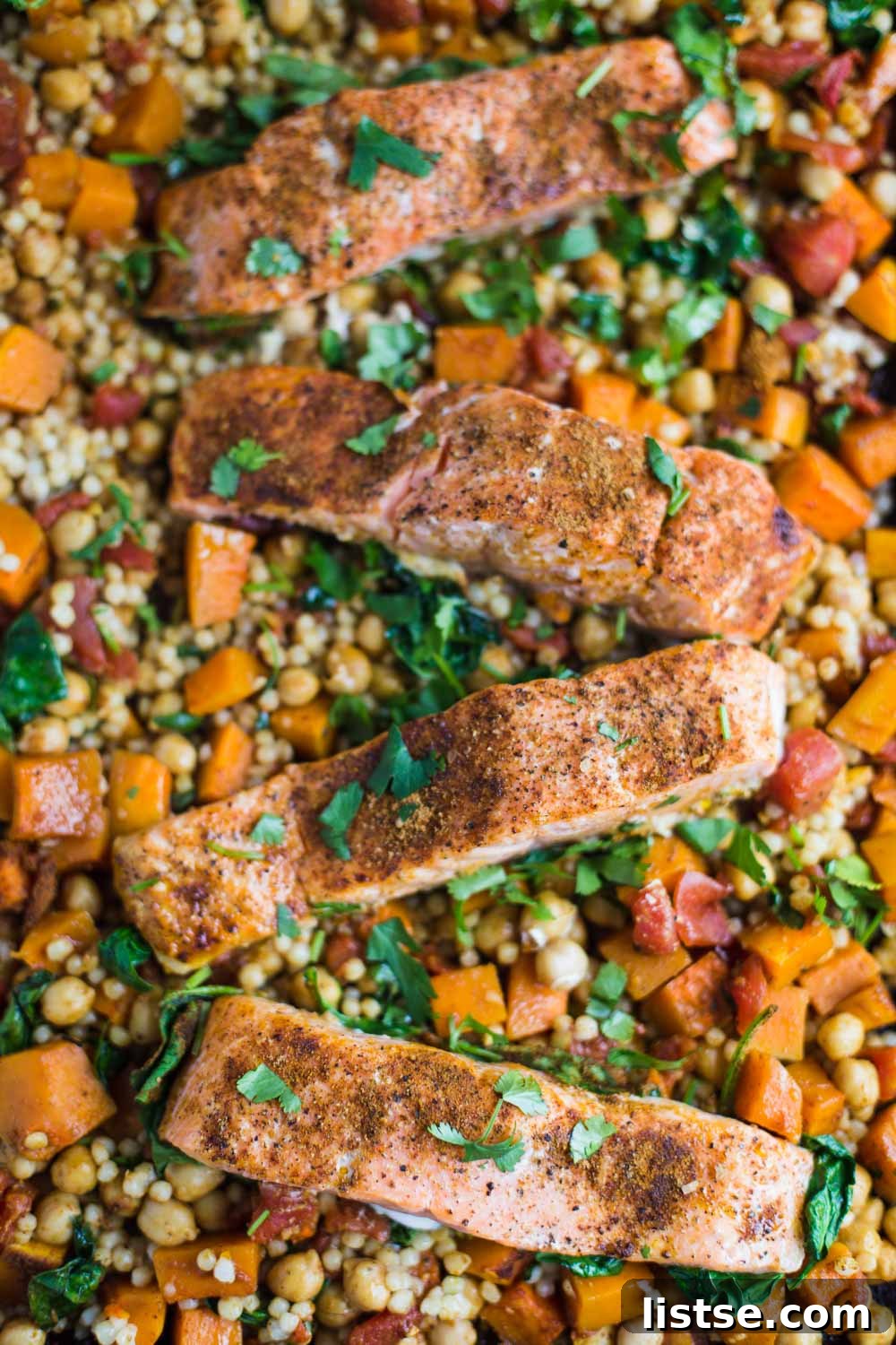 One Pan Salmon and Squash with Couscous- this recipe is made with a delicious Moroccan spice blend and is SO easy to throw together for dinner!