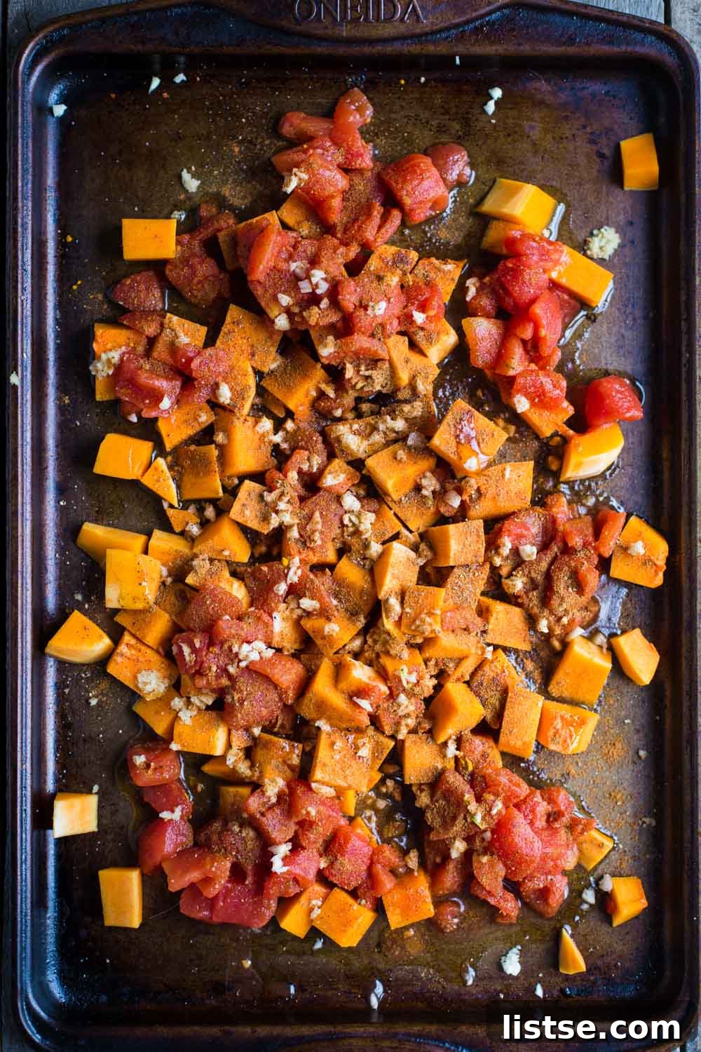 One Pan Salmon and Squash with Couscous- this recipe is made with a delicious Moroccan spice blend and is SO easy to throw together for dinner!