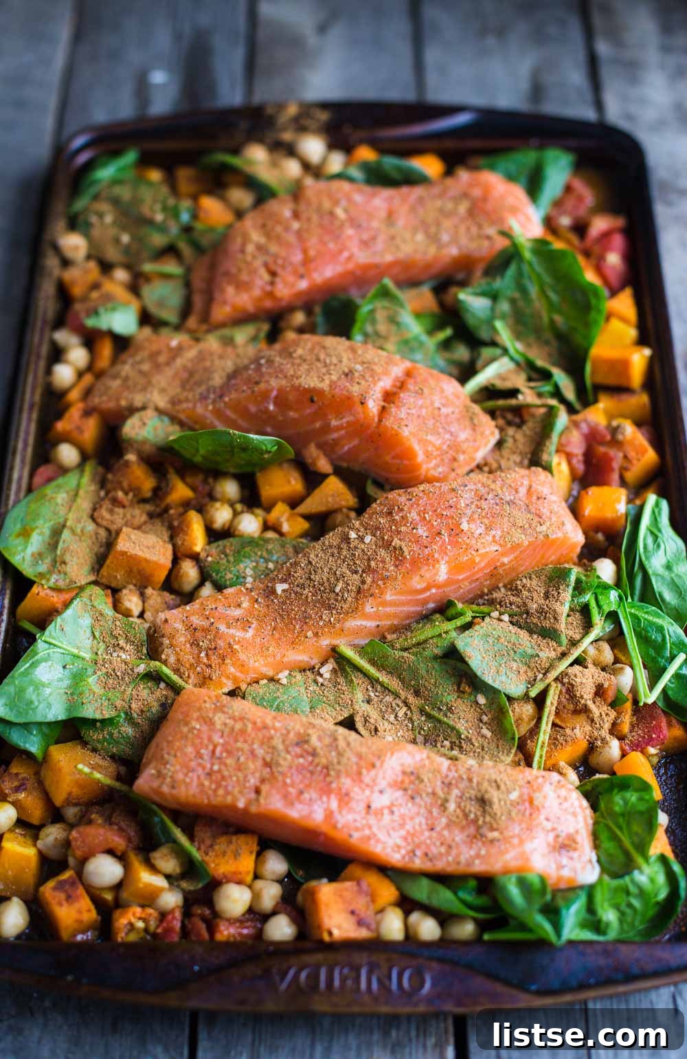 One Pan Salmon and Squash with Couscous- this recipe is made with a delicious Moroccan spice blend and is SO easy to throw together for dinner!
