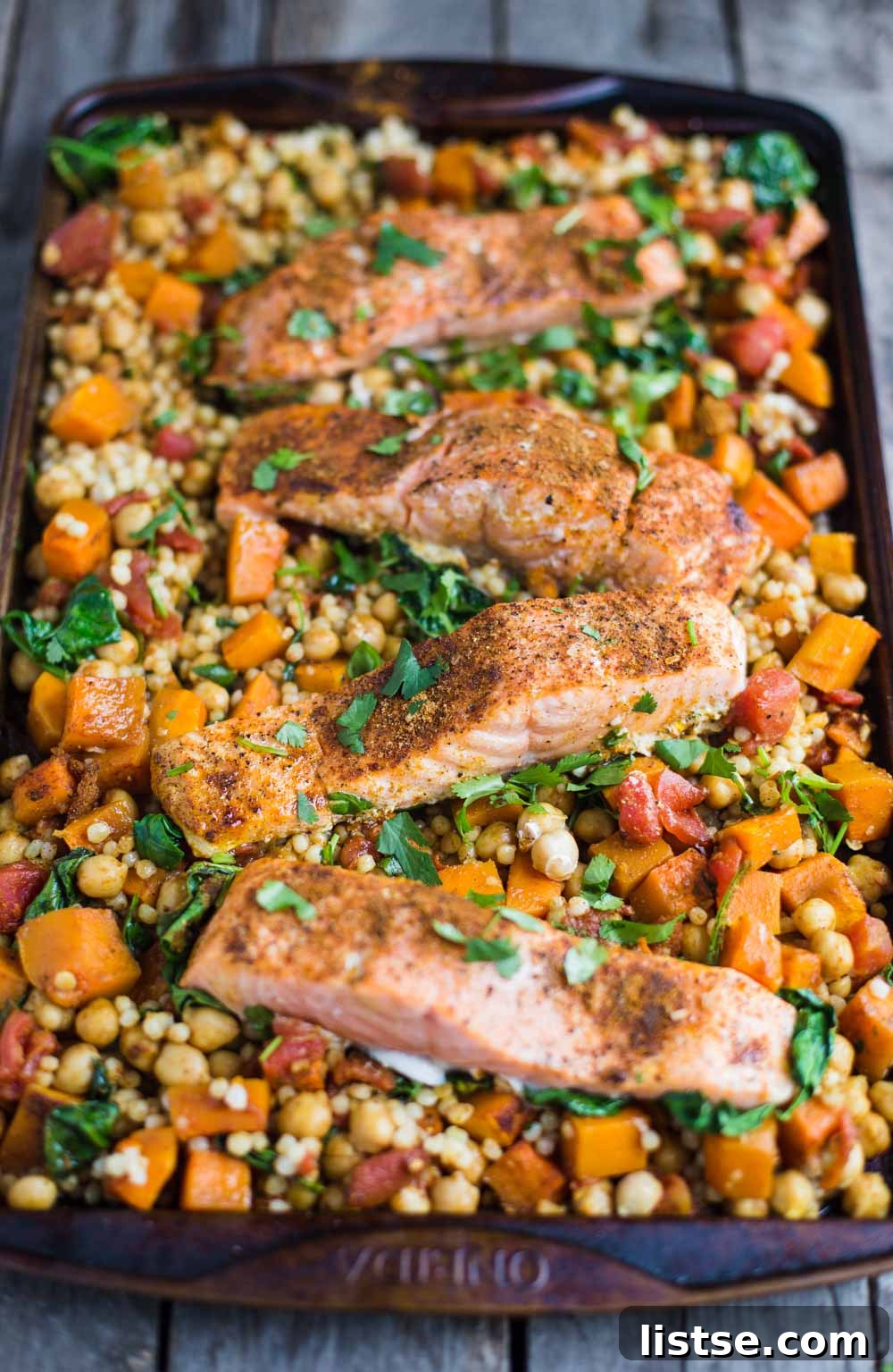 One Pan Salmon and Squash with Couscous- this recipe is made with a delicious Moroccan spice blend and is SO easy to throw together for dinner!