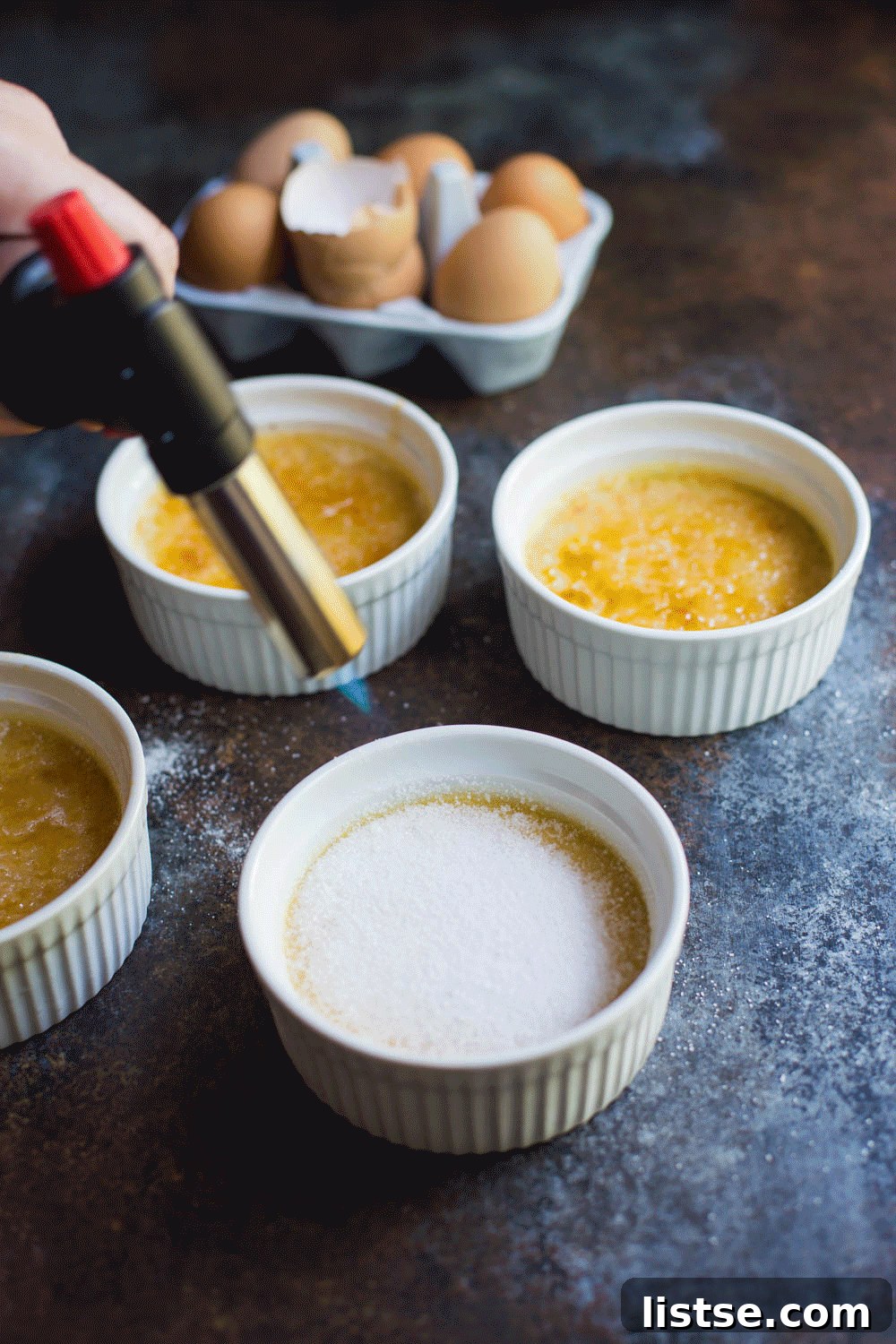 Animated GIF showing the satisfying crack of a torched Dairy-Free Crème Brûlée.