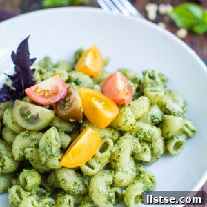 Delicious Vegan Pesto Pasta with fresh basil and tomatoes