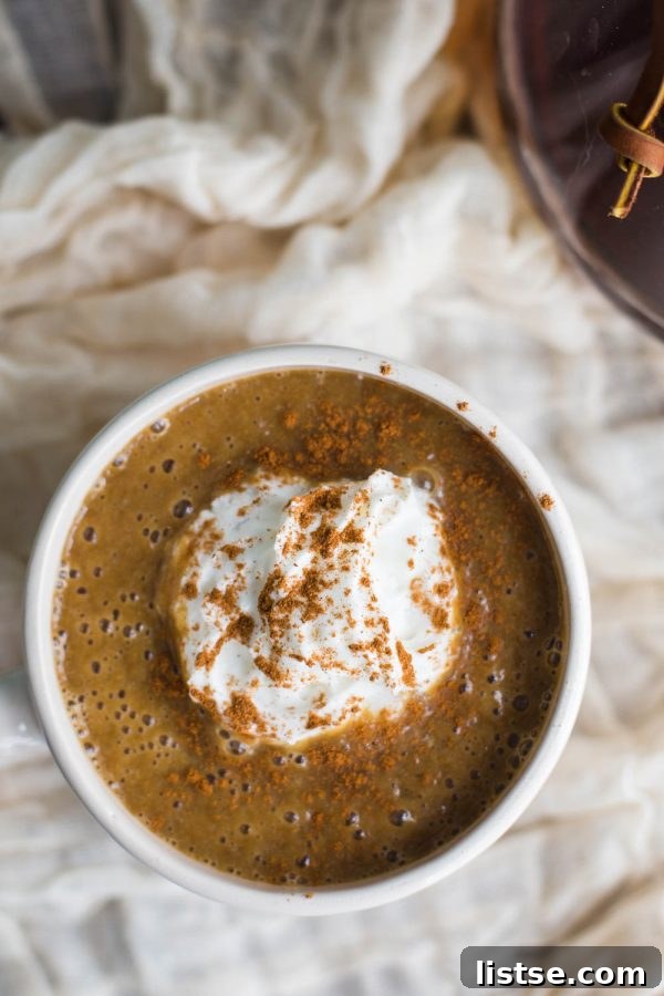 Warm Pumpkin Latte in a glass, showcasing its creamy texture