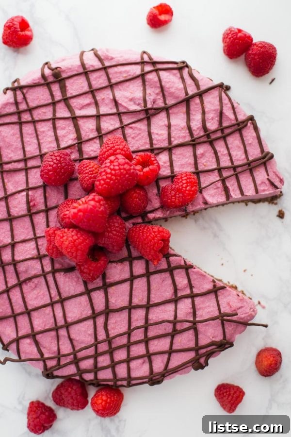 Delicious and vibrant Vegan Chocolate Raspberry Tart, perfect for a no-bake Valentine's Day dessert