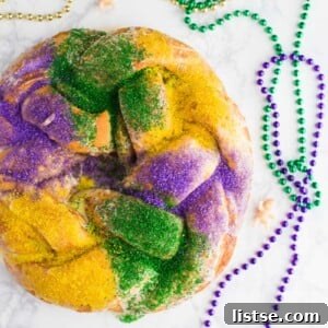 A baked vegan King Cake, beautifully golden, ready for icing and decorating.