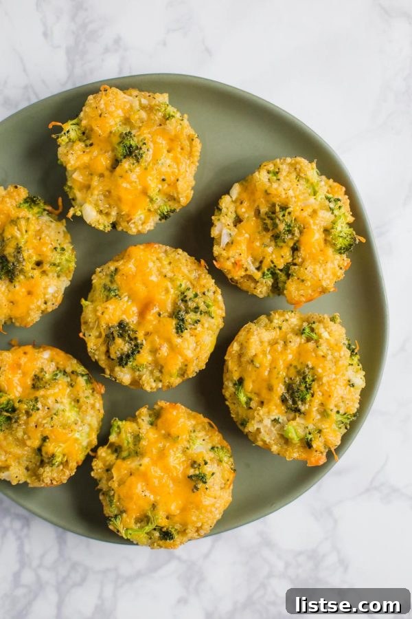 quinoa, cheddar cheese, and broccoli bites on a marble board