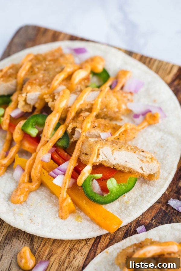Crispy Vegan Chickn Tacos 3 Close-up of Vegan Crispy Chick'n Tacos with fresh toppings