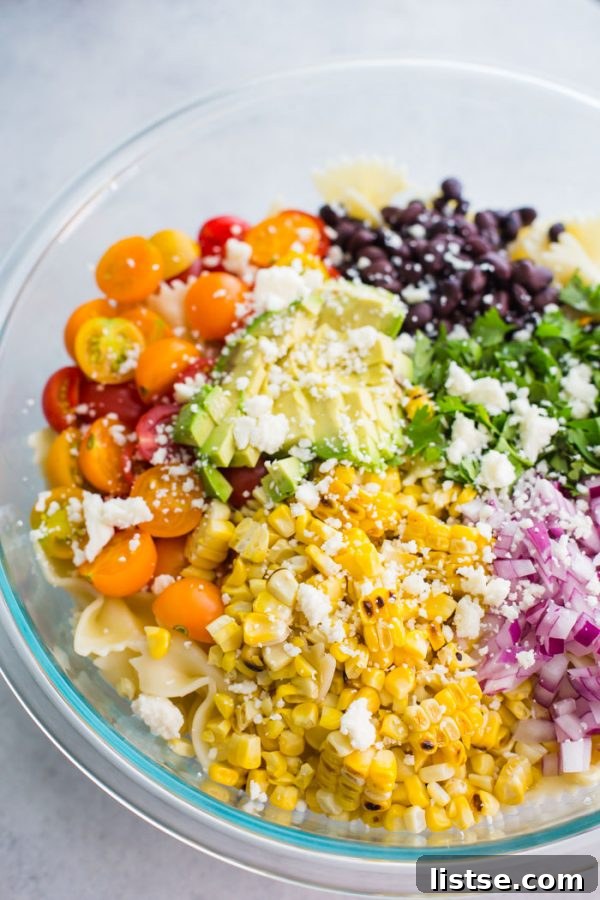 Zesty Fiesta Pasta Salad 4 Mexican Inspired Pasta Salad- this quick and easy vegetarian pasta salad is the perfect party dish or weeknight meal with delicious leftovers!