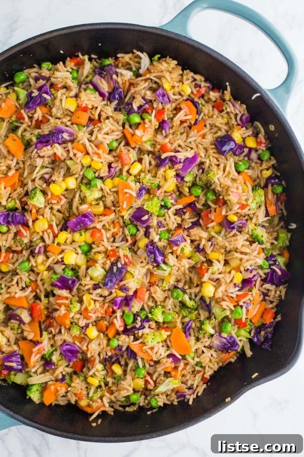 Loaded Veggie Fried Rice - A healthy, vegetarian, and vegan alternative packed with vegetables for a perfect side or main dish.