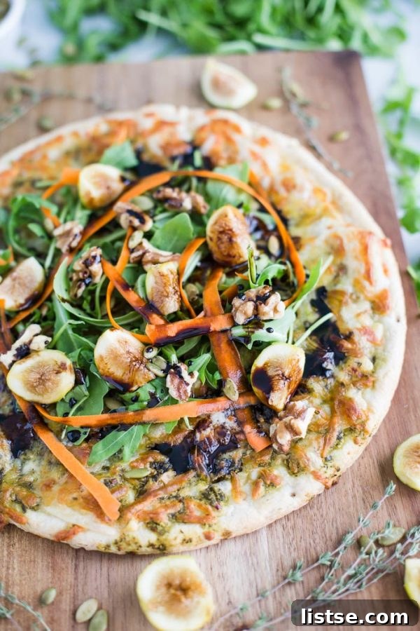 Rustic Fig and Walnut Salad 6 An appetizing close-up of a Sweet Earth pizza slice, highlighting the plant-based toppings and inviting texture.
