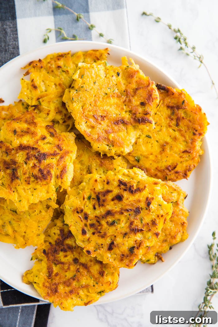 Butternut Squash Fritters- these VEGAN fritters are easy to make (just one bowl!) and are perfect as a side dish or even a main meal!