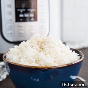 Cooked Basmati rice in a serving bowl, garnished and ready to be enjoyed