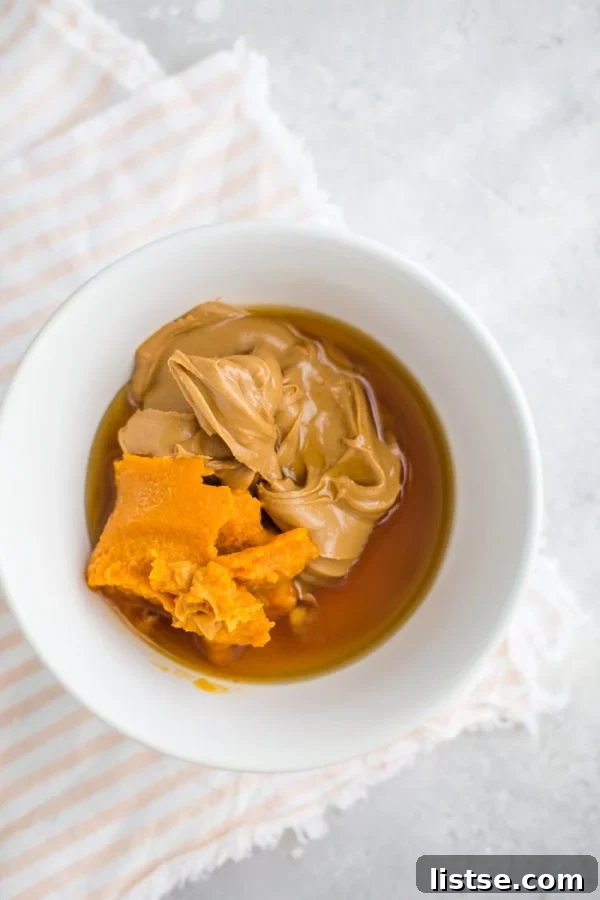 Close-up of the creamy pumpkin peanut butter filling for homemade cups