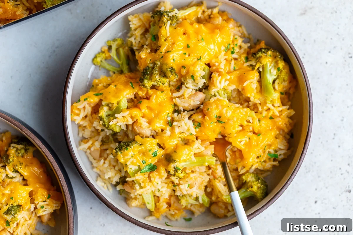 Cheesy broccoli and rice casserole in a bowl, ready to be served